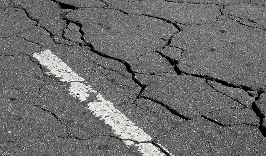 Image of a cracked road.