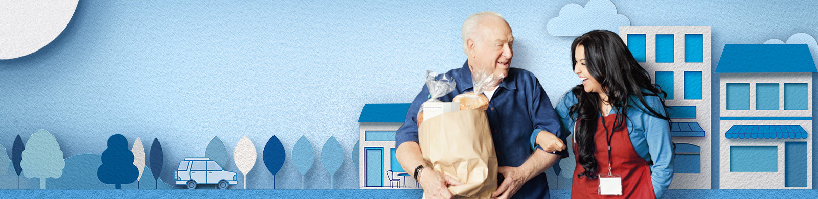 Man holding a grocery bag smiles with shop associate