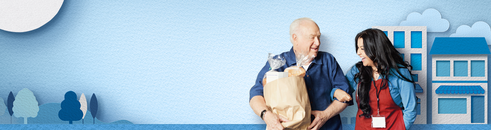 Man holding a grocery bag smiles with shop associate