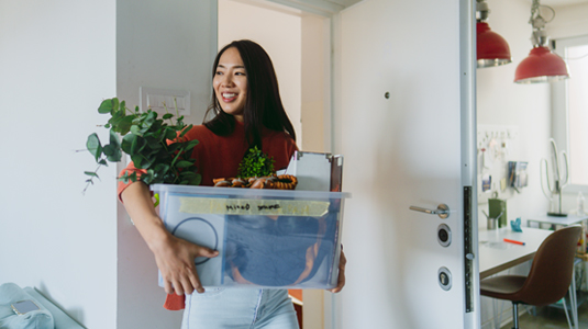 Student moving into her dorm room