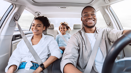 Family of three in a car