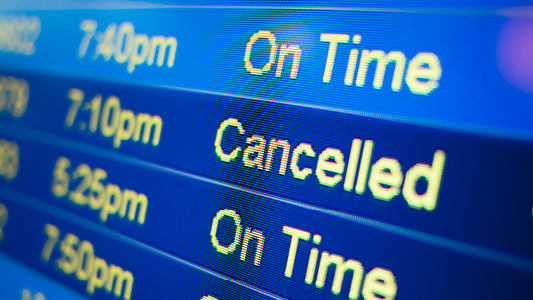 Generic shot of airport arrival board.