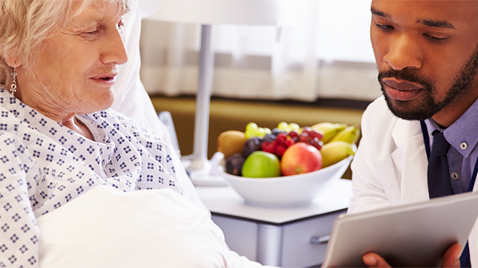 Doctor talking to patient