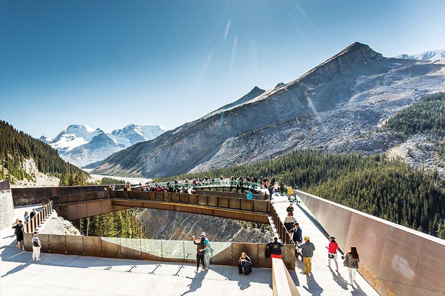 Image showing tourists walking along skywalk in the Rocky Mountains.