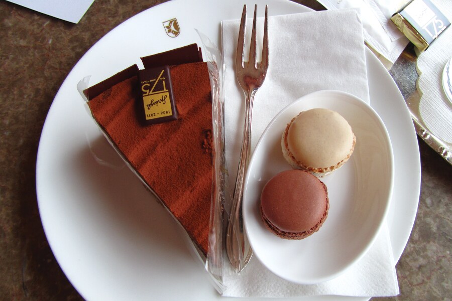 Photo showing chocolate dessert and pastries on a plate.