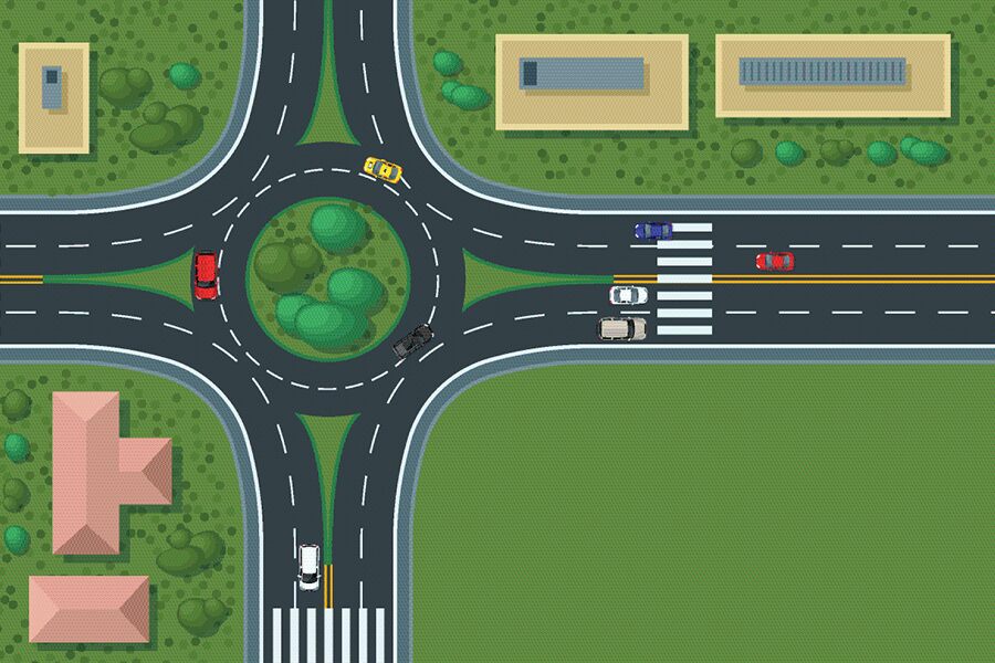 Animated image showing an overhead view of a roundabout traffic circle.