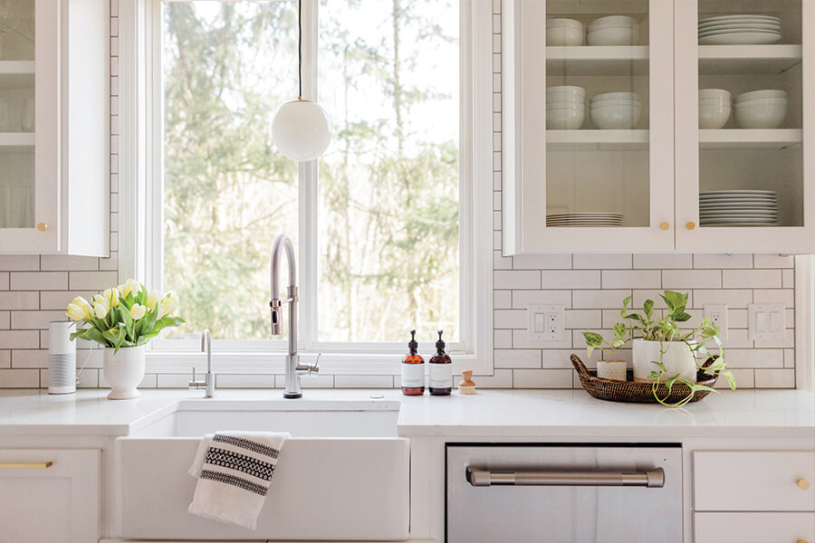 Image showing modern kitchen with white countertops and light grey tile.