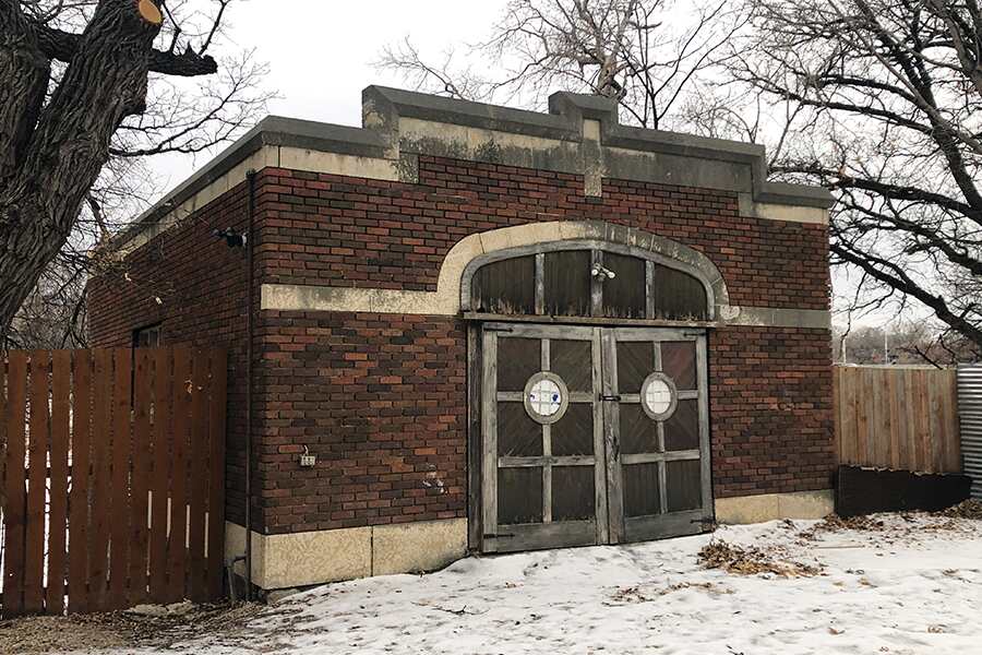 Image showing a brick carriage house built in the early 20th century in Winnipeg.