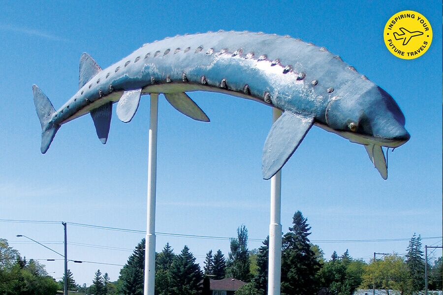 Image showing a statue of a sturgeon mounted on tall poles at Dominion City, Manitoba.