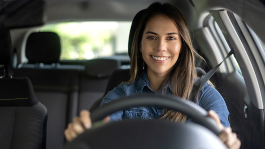 Female driver in a car.