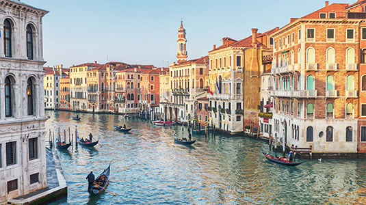 View of the Grand Canal in Venice at sunset.