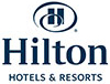 Hilton logo blue lettering with a stylized H above.