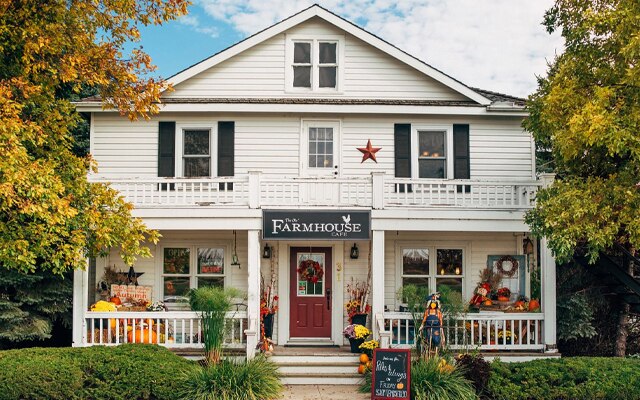 Image showing the exterior of a white two-storey building with a veranda.