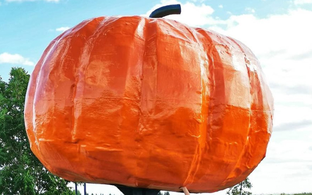 Image showing a statue of a giant orange pumpkin.