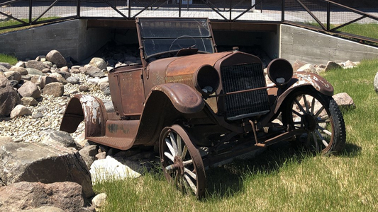 Image showing a rusted old automobile.
