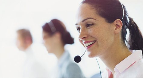 Customer service agent smiling.