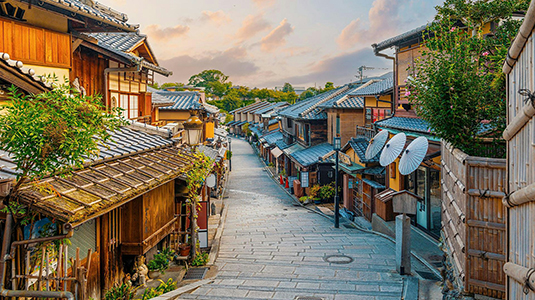 Tranquil Sunset Over Kyoto's Traditional Street, Ideal for Travel and Culture Themes
