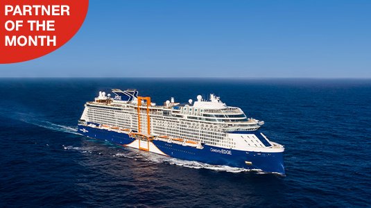 Celebrity Edge cruise ship on water. Partner of the month.