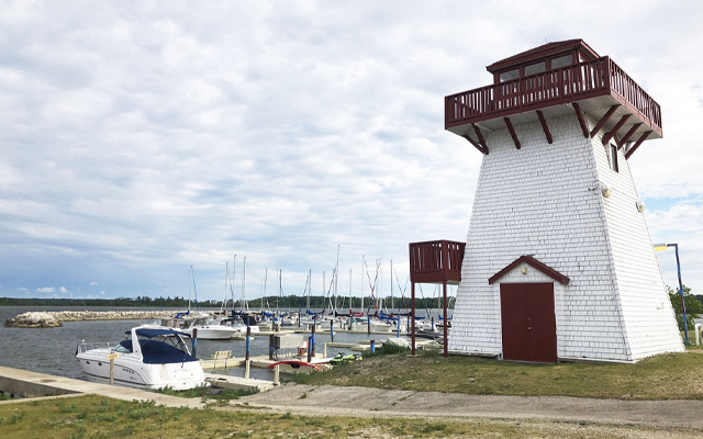 Image showing the dock area and lighthouse at Hecla.